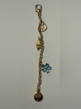 Gold-Tone Bracelet with Blue Flower Charm